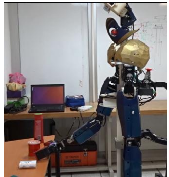 Fig. 2: Justina and HSR object manipulation using the same programs both under the ViRBot architecture