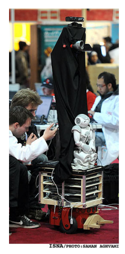 (Left) Our previous prototype at the Iran Open 2011 competitions, a combination of a Nao and a Pioneer robot. (Middle) Our current prototype design with additional omni wheels for higher load capacity. (Right) Our current prototype as used in the Dutch Open 2012 competitions.