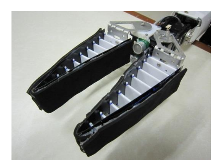 Fig. 5. An ultrasonic sensor for detecting grasped objects