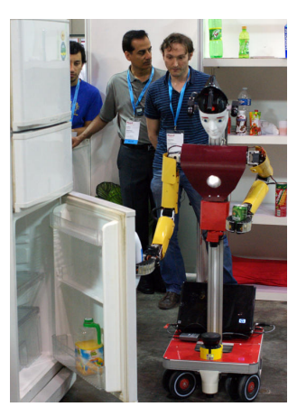 Left: Cognitive service robot Cosero grasps a spoon. Right: Dynamaid manipulates the fridge.