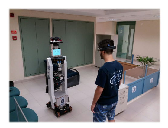 Fig. 2. A scenary showing a human-robot interface that recognize emotions with a neural equipment