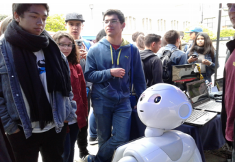 Fig. 2. Pepper participating in science fairs.