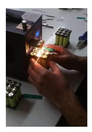 A discharge form the spot welder creating sparks due to extra force