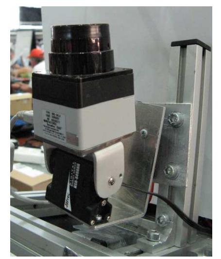 (a) The Hokuyo URG-04LX laser range finder (LRF), mounted on a rotation/tilt-unit.