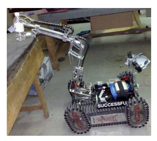 Success's gripper and camera arm