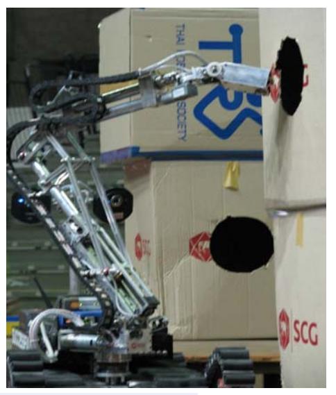 Success's gripper and camera arm