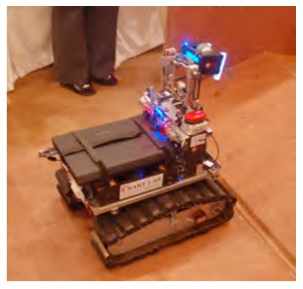 Fig. 2. The Autonomous robot, AutoBotI, is track-based locomotion system with victim identification sensing system based on image processing and heat imaging technology.