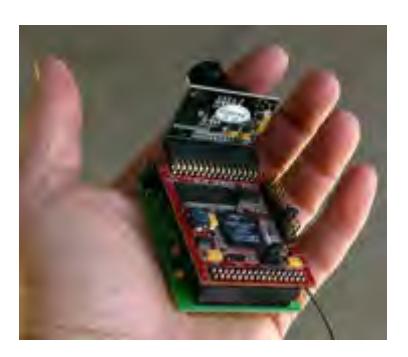 Fig. 3. Surveyor SRV-1 Blackfin controller with OmniVision OV7725 camera and Lantronix Matchport 802.11 b/g radio.