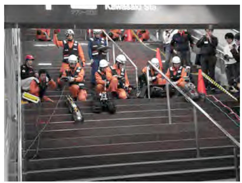 KOHGA2 (center robot) used by Japanese fire fighter in underground city