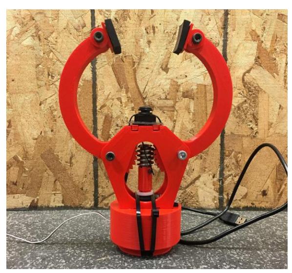 Grasper with mounted camera for object visual detection.