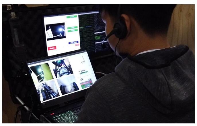 Fig. 10. The operator station used by the driver to remotely control the robot to do the mission from another side.