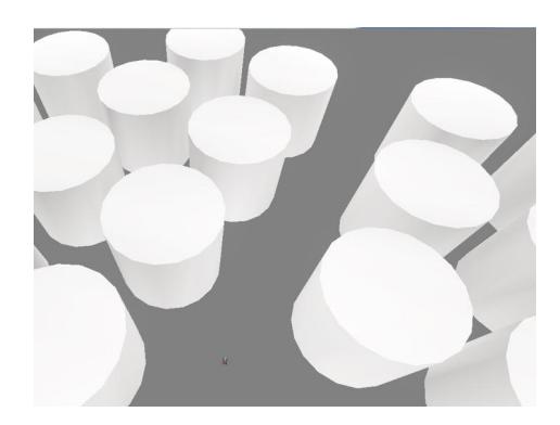 Fig. 2. Tanks and a robot in virtual Fukushima Daiichi Nuclear Plant. The black dot in the center is P3AT robot.