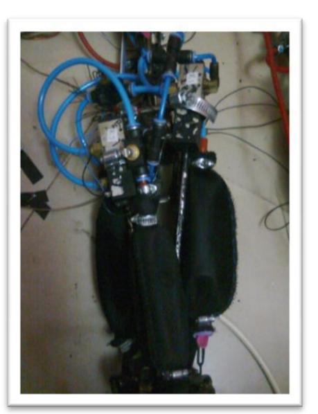 Pneumatic Cylinder working side by side with Pneumatic Muscles.