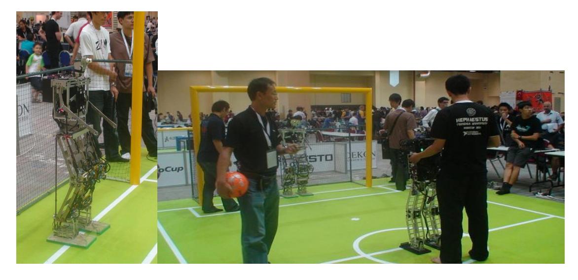 Fig 1. Our adult size humanoid robot in the competition field of RoboCup 2011.