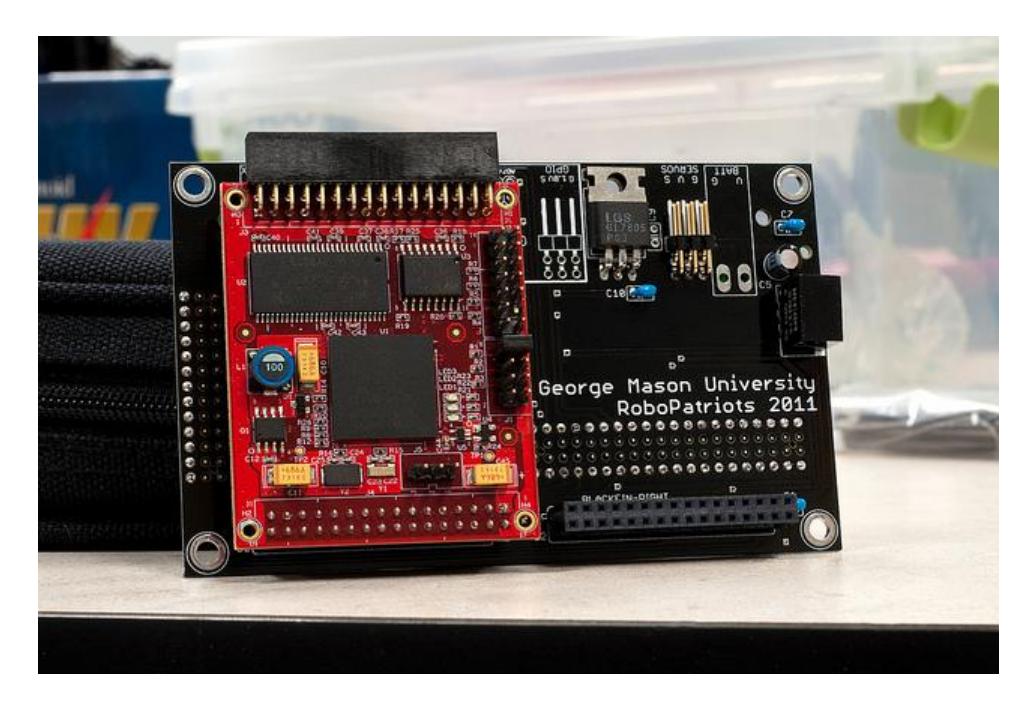 A prototype of the integrated motherboard connecting the Gumstix computer and SVS modules.