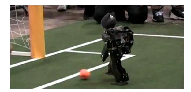 Fig. 3. Team Cyberlords + Falconbots scoring at RoboCup 2012, Mexico City
