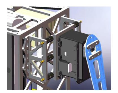 Fig. 3. Dynaped's mechanical precautions against damage resulting from falls. The shoulder (left) is fixed to the frame by six flexible struts made from hard rubber. The hip (right) is a pull linkage with a spring that holds the torso in place.