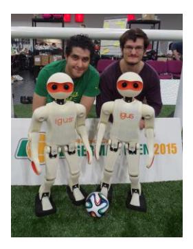 Left: The first two authors with igus Humanoid Open Platform robots. Right: Two generations of igus Humanoid Open Platform robots.