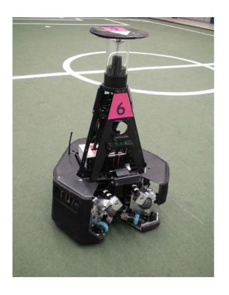 Fifth generation TURTLE with cover attached (left), with cover removed (middle) and customized goalkeeper design (right).