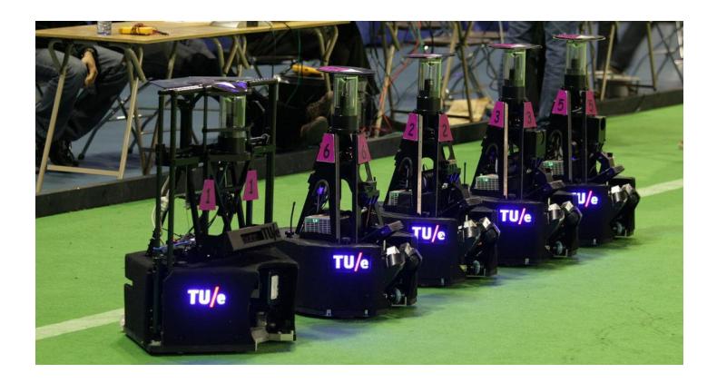 Fifth generation TURTLE robots, with on the left-handside the goalkeeper robot.