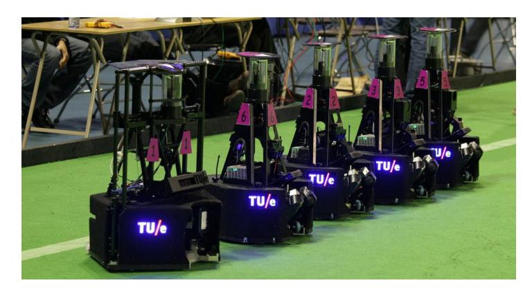 Fifth generation TURTLE robots, with on the left-handside the goalkeeper robot.