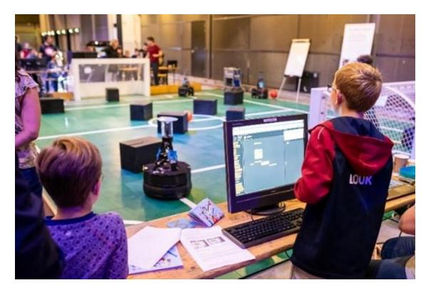 Students testing their solution for the maze during the workshop.