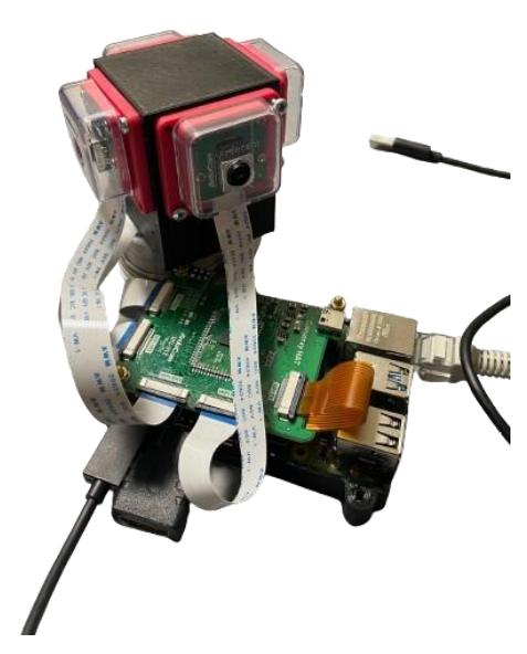 Fig. 5. Omni-vision system with 4 cameras and Raspberry Pi for forwarding image to main processor
