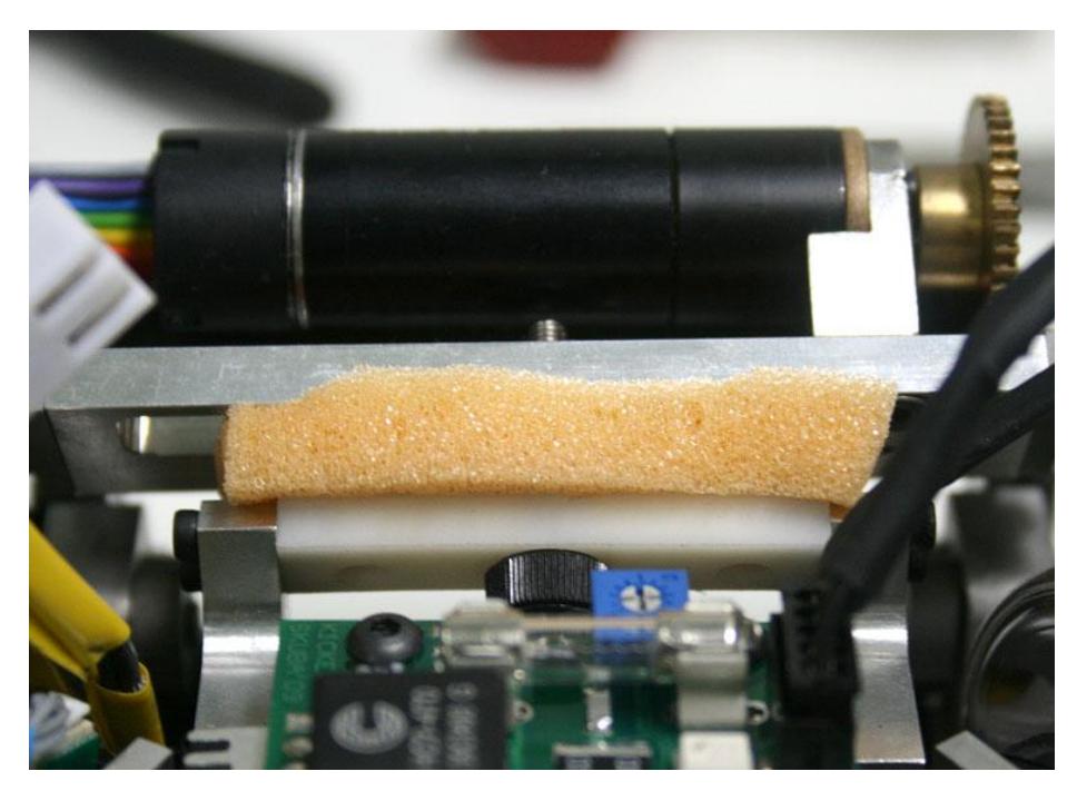 The suspension with sponge damper.