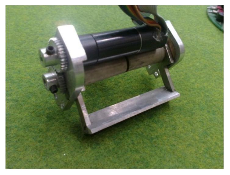 Fig. 8. The spin back and chip kick system.