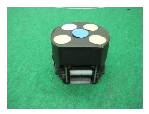 Fig. 1. RoboDragons new robot (Left: with cover, Right: without cover)