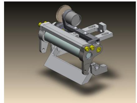 Fig. 4. (a) The new chip kick solenoid and plunger (b) Dribbling and Suspension System