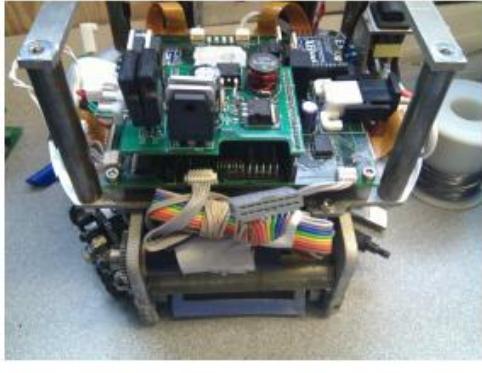 Fig. 6: (a) 2 XBee's on the Main Board (b) Mounted Boost Converter