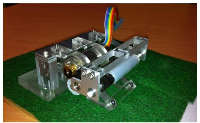 Fig. 4 Experimental mechanism for dribbling device