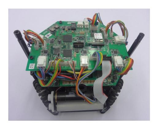 Fig. 1. Robot developed in 2012 (Left: without cover, Right: with cover)