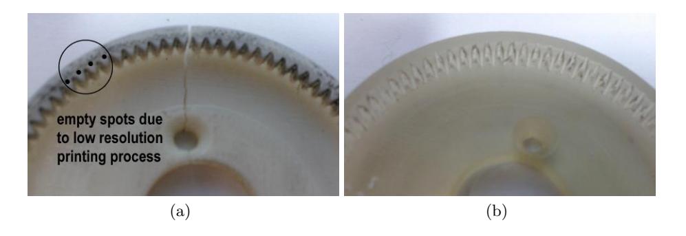 (a) Cracked gear (lower precision). (b) Stereolithography printed gear.