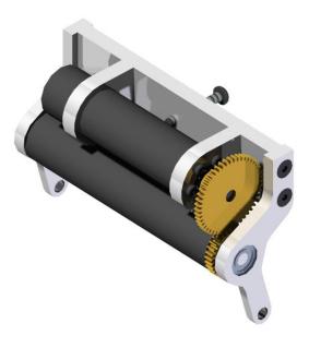 Fig. 4. Dribbling System. The top of the dribbler device contains both the cylindrical rod and the brushless motor to keep the ball from moving forward when the robot moves.
