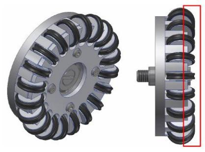 (a) First version of the wheel's cover plate. Sub-wheels are exposed (red). (b) Updated version of the cover plate. Sub-wheels are completely covered to prevent direct impacts.