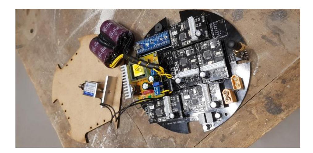 The kicker circuit, the solenoid and the two capacitors