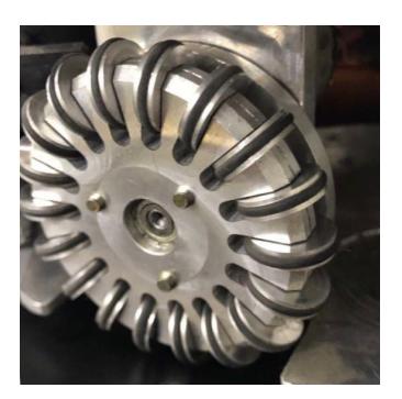 Fig. 7: (a) Old wheel made in plastic (b) Machined aluminum wheel