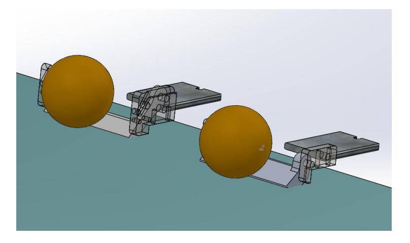 Fig. 3. A view of the old (top left)and new (bottom right)chip kickers in a simulation environment