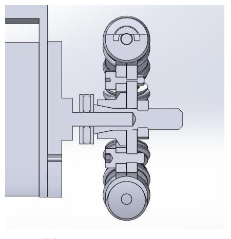 (a) Old mounting system (b) New mounting system