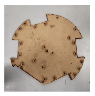 Fig. 1: Bottom base with worn-out holes.