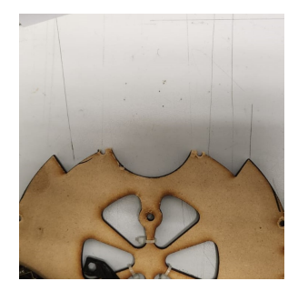 Fig. 2: Top base with a missing section due to worn-out holes.