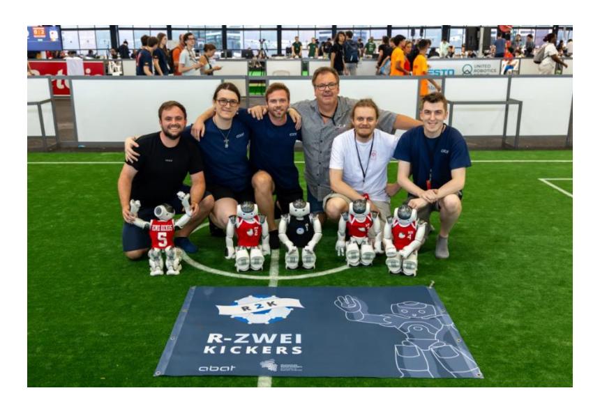 The team as present at the RoboCup 2023 in Bordeaux, from left to right: Philipp Stopp, Andy Hobelsberger, Thomas Jäger, Adrian Müller, Wilhelm Simus, David Kostka