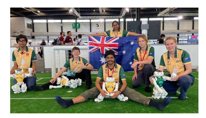The rUNSWift 2023 team members at RoboCup 2023 in Bordeaux, France. From left to right: Neeraj Gopikrishnan, Nicholas Bell, Stefan Immaraj, Mary Pillay, Mikhail Asavkin, Maria Lizura
